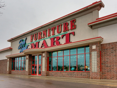 Furniture Mart USA donates $25,000 to local food banks